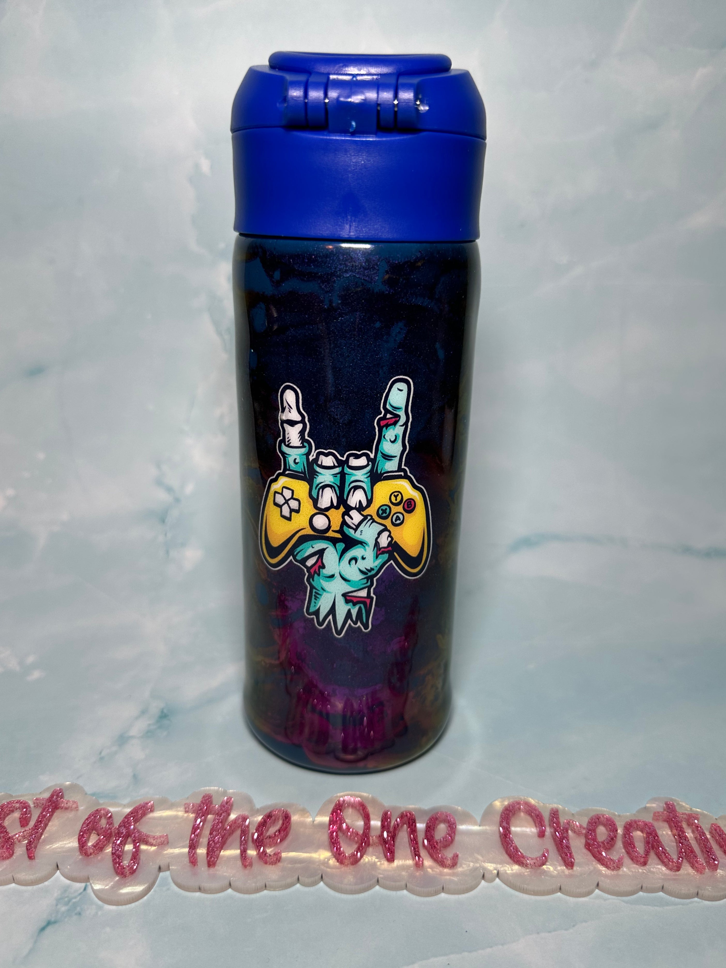 12 oz Water Bottle with rock on sign and video game controller