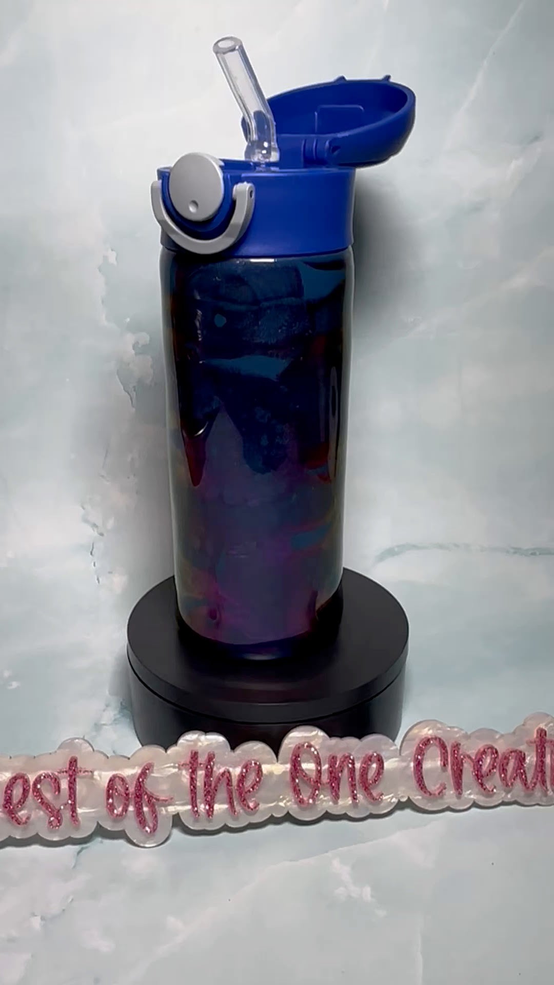 12 oz Water Bottle with rock on sign and video game controller